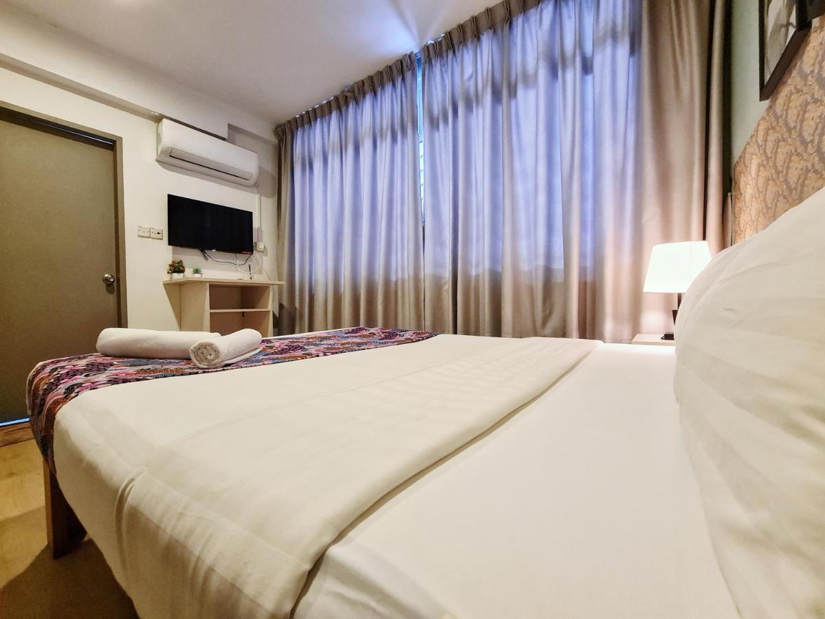 Treeline Urban Inn Кота-Кінабалу Екстер'єр фото