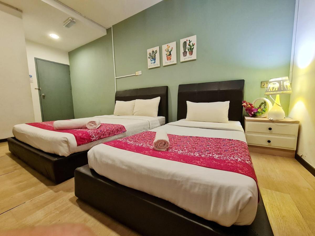 Treeline Urban Inn Кота-Кінабалу Екстер'єр фото