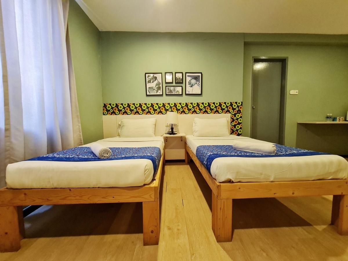 Treeline Urban Inn Кота-Кінабалу Екстер'єр фото