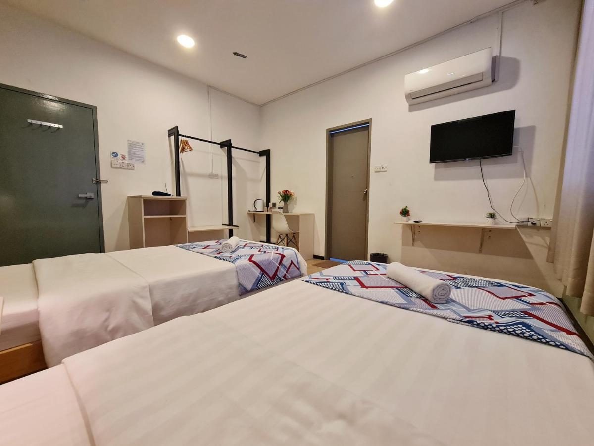 Treeline Urban Inn Кота-Кінабалу Екстер'єр фото